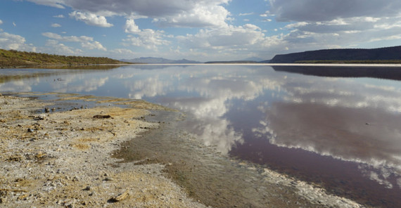 Clouds reflecting in lake Magadi, Kenya, located in the Eastern Branch of the East African Rift System. The high rising flanks of the Rift’s border faults can be seen in the background. | Photo: Corinna Kalich, University of Potsdam Clouds reflecting in lake Magadi, Kenya, located in the Eastern Branch of the East African Rift System. The high rising flanks of the Rift’s border faults can be seen in the background. | Photo: Corinna Kalich, University of Potsdam