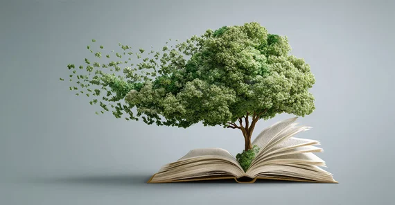 Symbolbild: Ein belaubter Baum wächst aus einem aufgeschlagenen Buch. Blätter und Seiten werden von Wind bewegt.