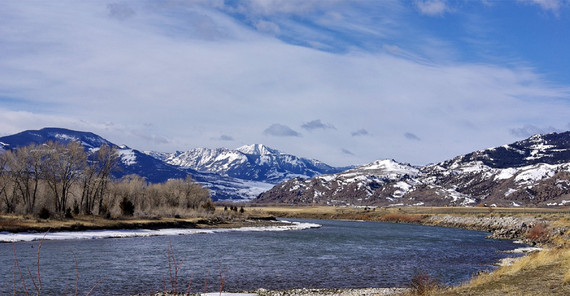 Lake in front of snow-covered mountains