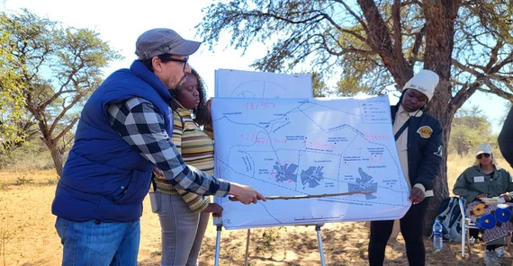 man presenting on a flipchart