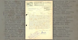 Ein vergilbtes Dokument der DEFA mit Schreibmaschinenschrift.
